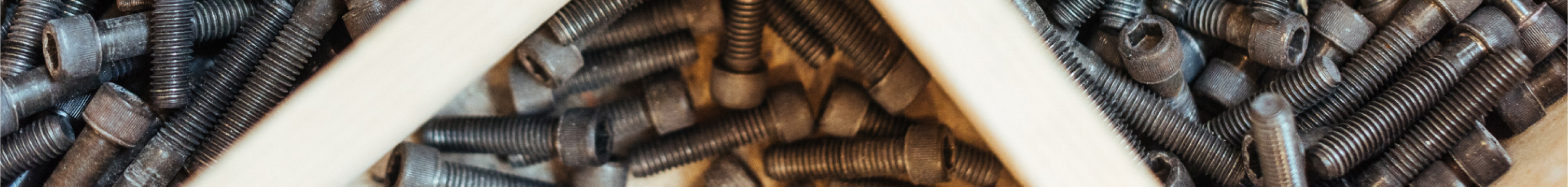 A tray of climbing hold bolts